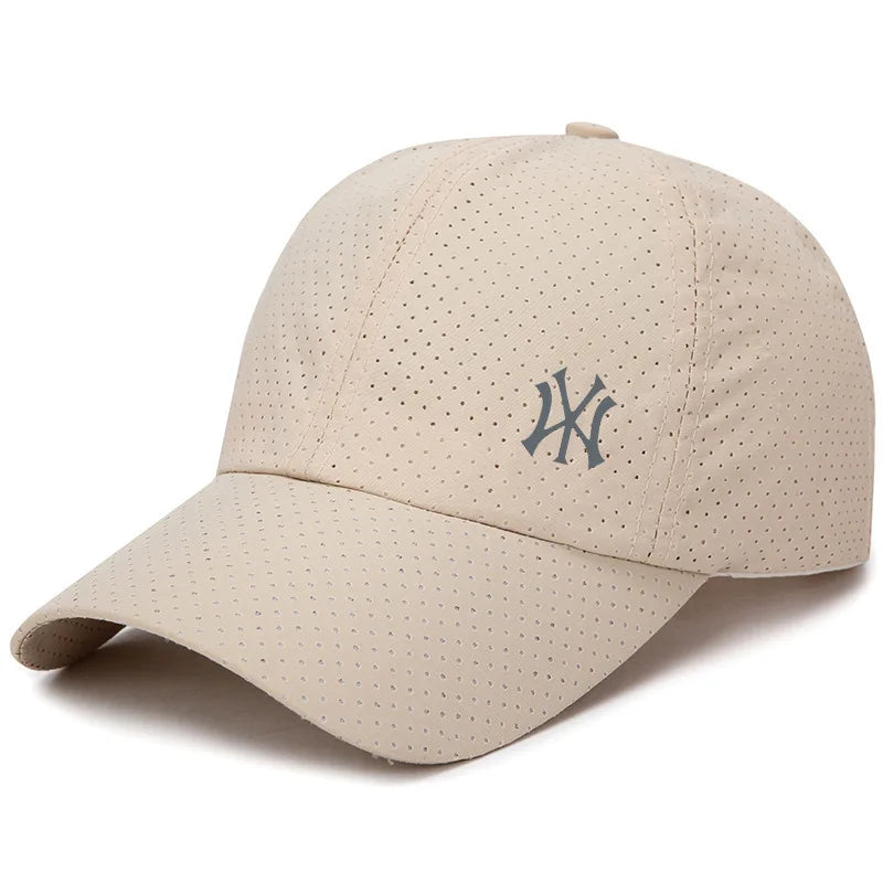 A beige unisex adjustable baseball cap featuring a dark embroidered interlocking NY logo.