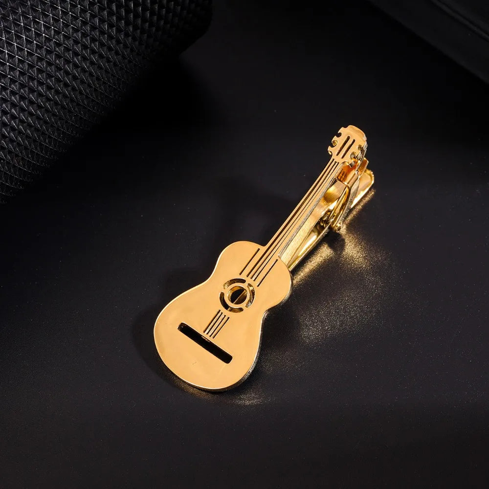 Goldfarbiger Titan-Klammer, geformt wie eine Gitarre, zur Sicherung musikalischer Instrumente.