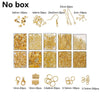 A collection of gold-colored jewelry findings including clasps, hooks, jump rings, and various sizes.