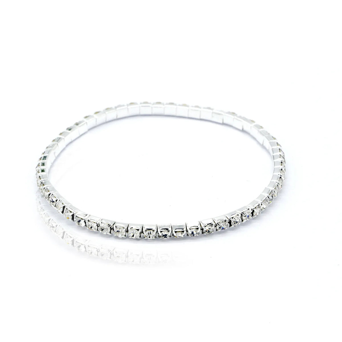 A close-up shot of a multi-layer crystal tennis anklet for women.