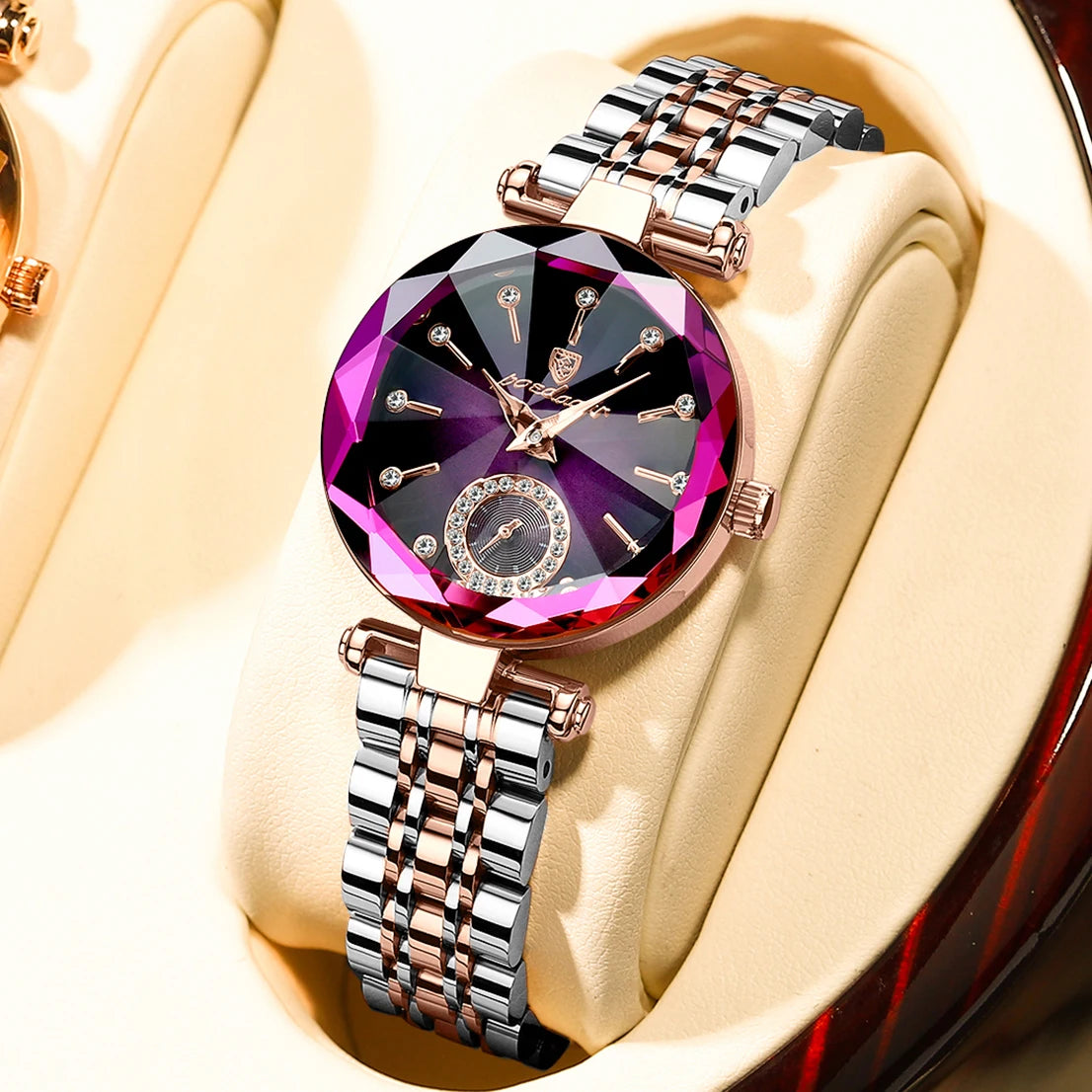 A close-up of an elegant stainless steel quartz ladies wristwatch with a purple and black gemstone face and metal bracelet.