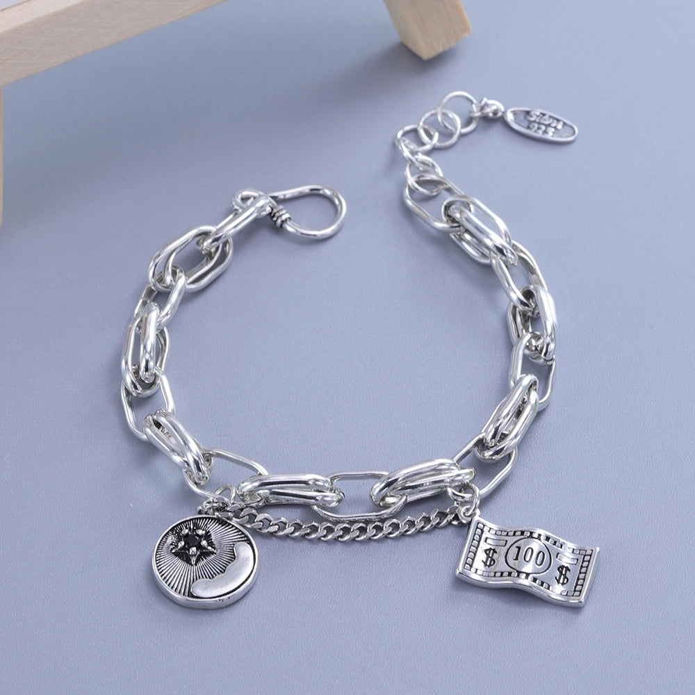 Sterling silver double heart charm bracelet with a chain and a $100 bill charm