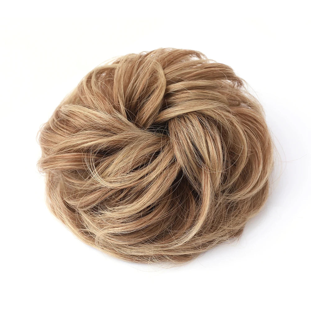 A light brown messy bun hairstyle made from hair