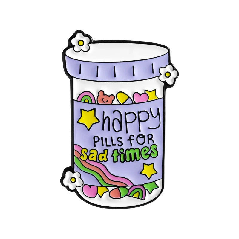 An enamel lapel pin shaped like a purple jar labeled Happy Pills for sad times decorated with colorful elements.
