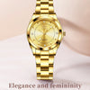 A gold-toned quartz watch with a round face and metal bracelet displayed on a white surface.