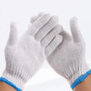 A pair of light gray cotton thread work gloves being held together.