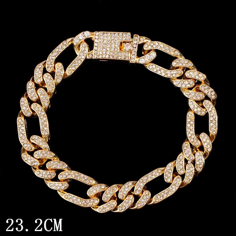 A close-up of a gold crystal Cuban link bracelet for women.