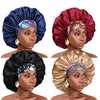 Four satin sleep bonnets in navy blue, maroon, black, and gold tones shown on models.