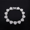 A set of sparkling heart rhinestone necklaces and bracelets displayed against a black background.
