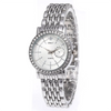 Silver crystal quartz wristwatch with a metal link bracelet and a diamond-studded bezel