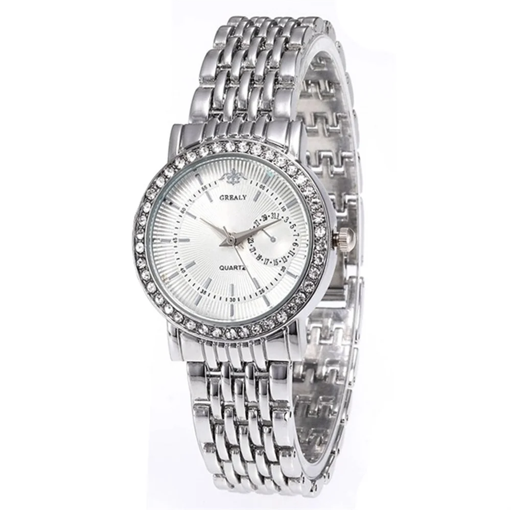 Silver crystal quartz wristwatch with a metal link bracelet and a diamond-studded bezel