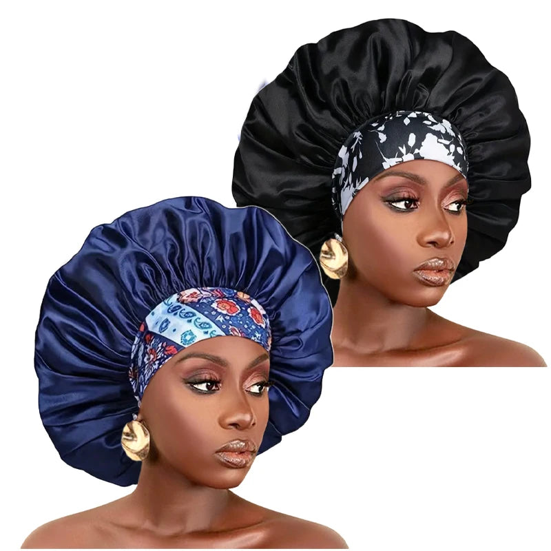 A woman models a black satin sleep bonnet with an elastic band and a floral patterned fabric.