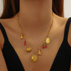 Gold stainless steel starfish heart pendant necklace worn around the neck.