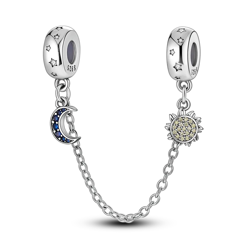 Sterling silver devil's eye charm bracelet featuring a silver charm and a gold-toned flower charm