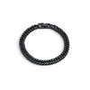 A black stainless steel Cuban link bracelet shown against a white background.