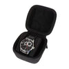Black leather watch travel case organizer with an open lid displaying a wristwatch.