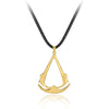 Gold stainless steel pendant necklace shaped like a triangle and a crescent moon on a black cord