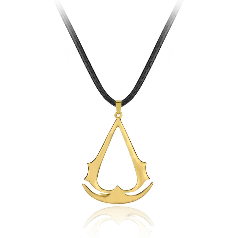 Gold stainless steel pendant necklace shaped like a triangle and a crescent moon on a black cord