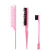 A set of pink hair rollers and styling tools including a wide-toothed comb and a black brush.
