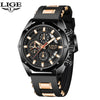 A black men's luxury quartz sport watch with a chronograph feature and gold accents.