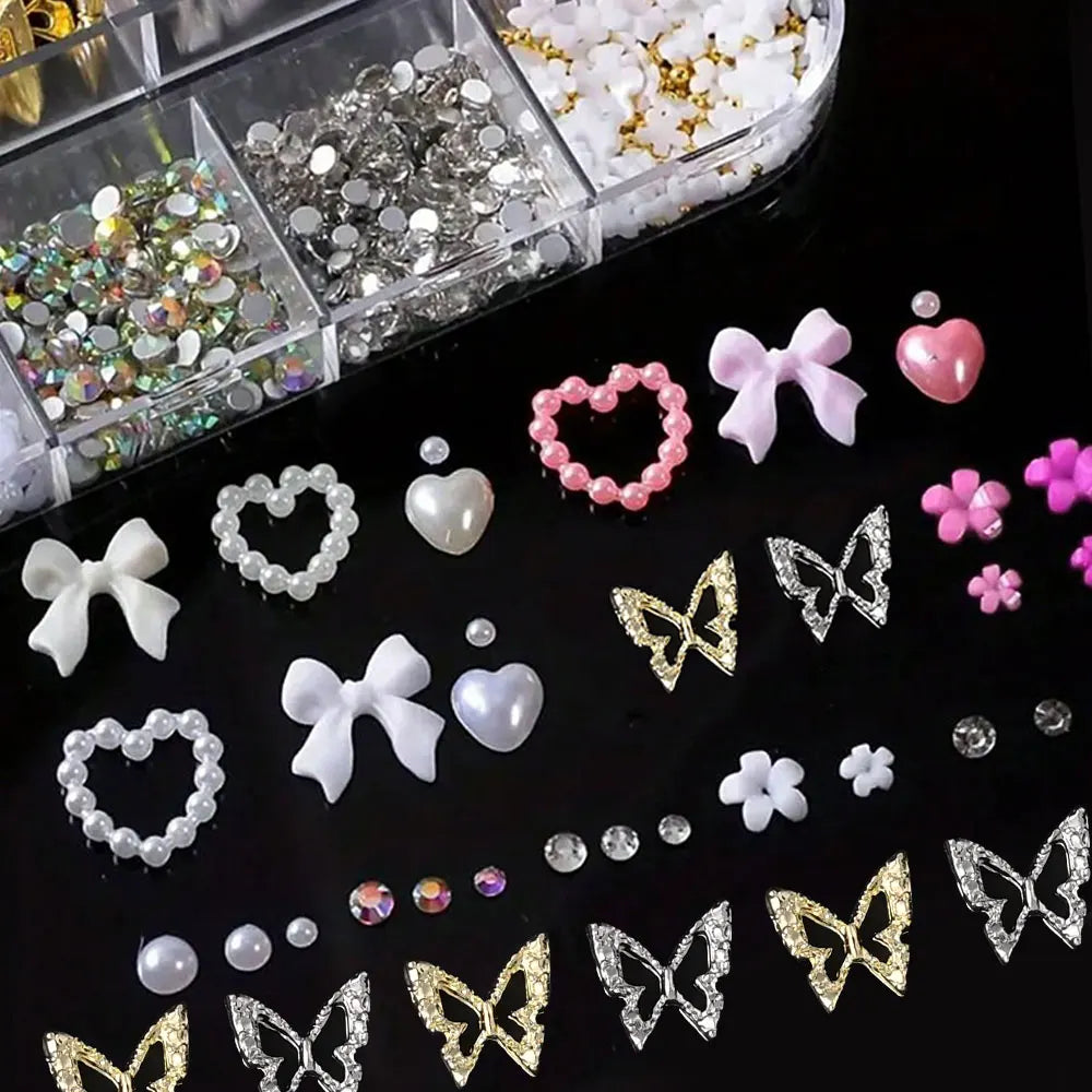 A collection of pink and white butterfly bow nail charms, including various sizes and glitter finishes.