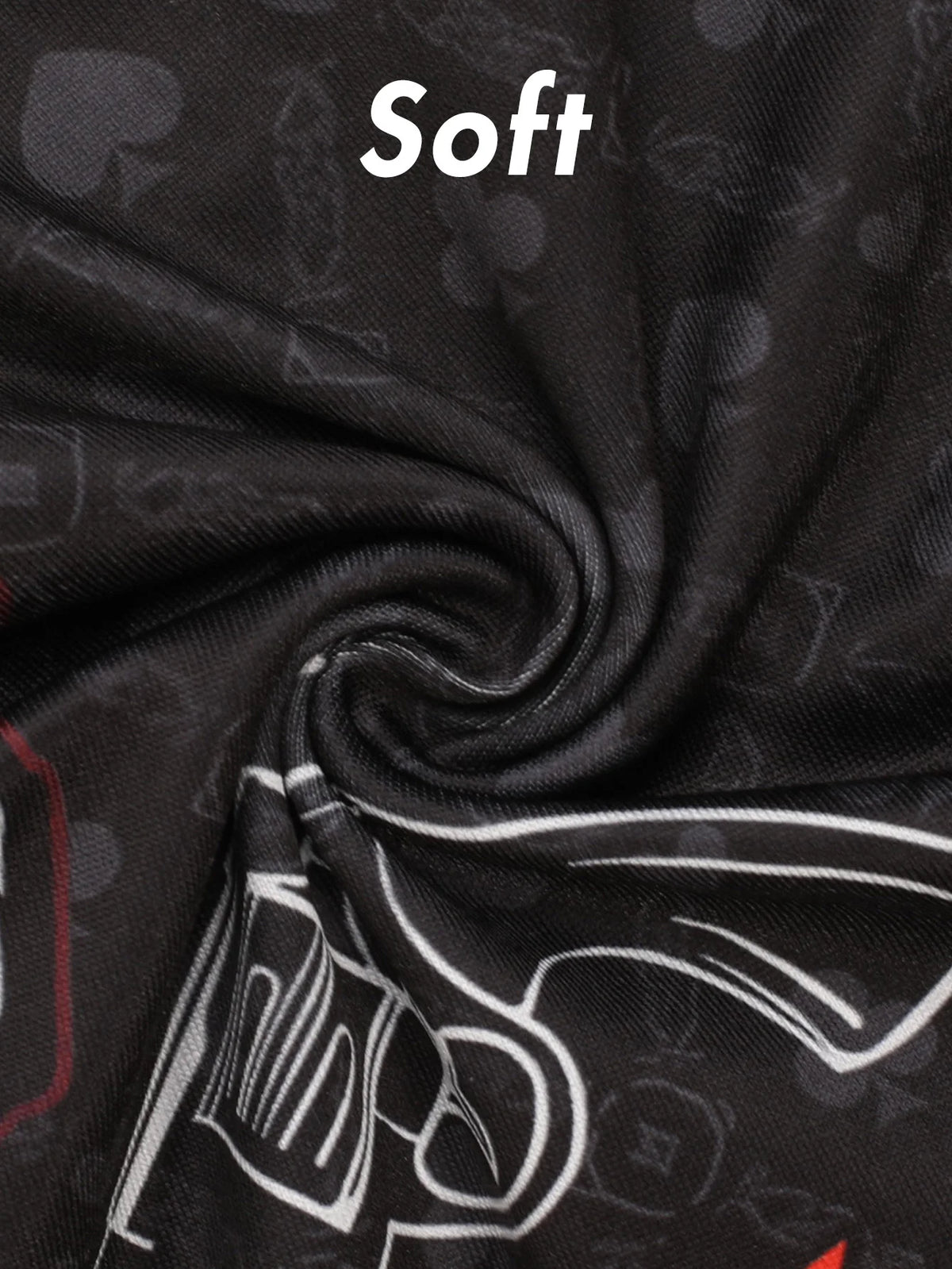 Black soft fabric material with a subtle pattern, showing a close-up texture.