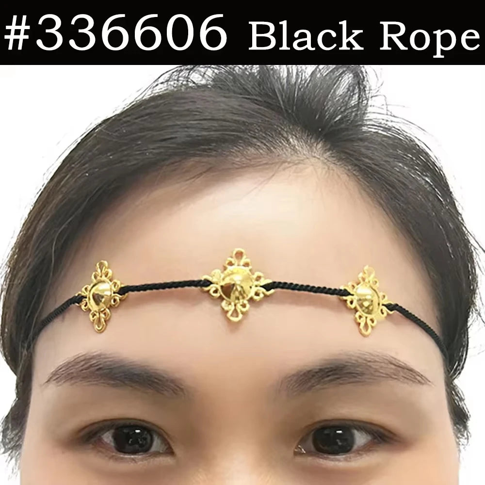 A close-up of a woman wearing a black rope traditional Ethiopian head chain with gold accents.