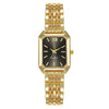 A gold minimalist quartz watch with a black dial and gold-toned links on a white background.