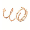Aretes tipo aro dobles de tono dorado hechos de acero inoxidable con acabado CZ.