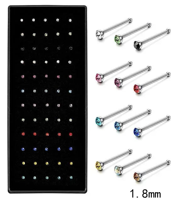 A collection of fashion crystal stainless steel nose stud piercing jewelry in various sizes and colors.