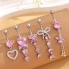 A set of five gold stainless steel dangled belly button rings featuring pink and clear stones.