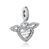 A silver heart-shaped charm with a family tree design and the inscription I pray you wings and fly.