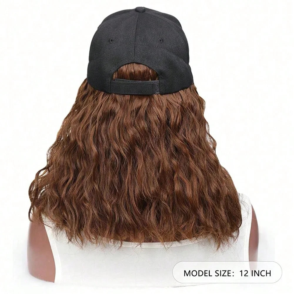 Back view of a brown wavy wig with a black adjustable cap and white hairpiece.