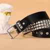 Black leather belt with silver rivets worn by a white bust with gold accents.