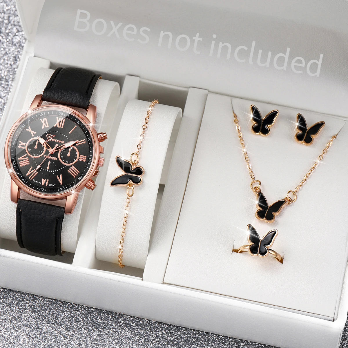 A white box contains a rose gold watch, a gold butterfly necklace, and a gold butterfly ring.