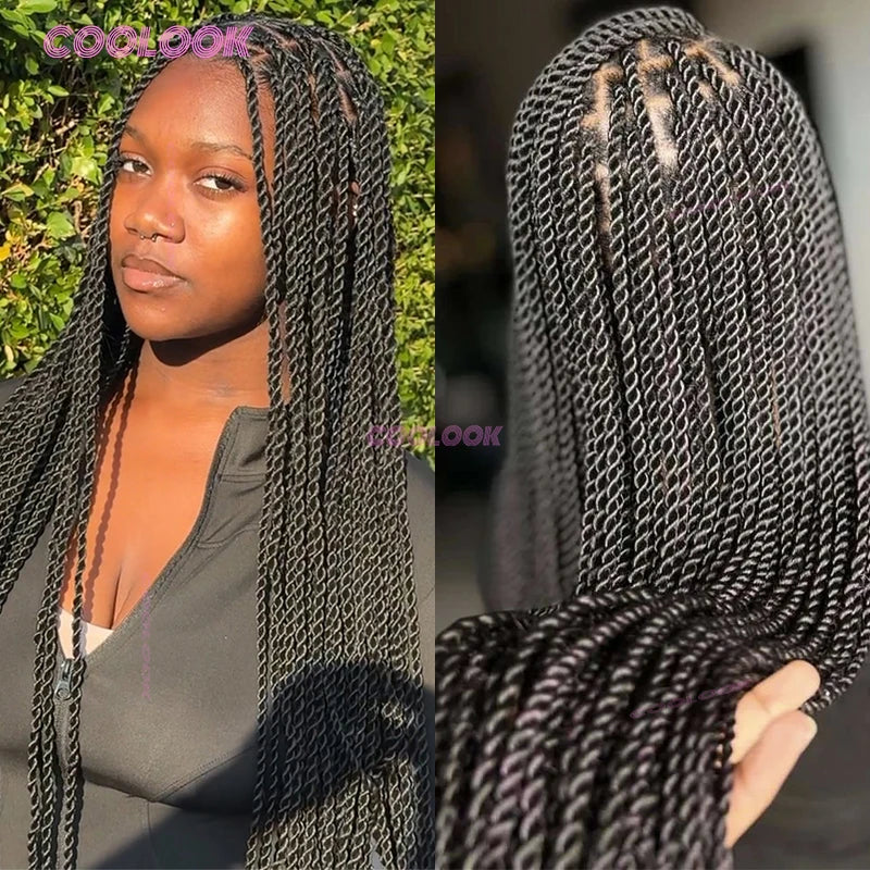 A woman with long black cornrow braids is shown in a close-up shot.