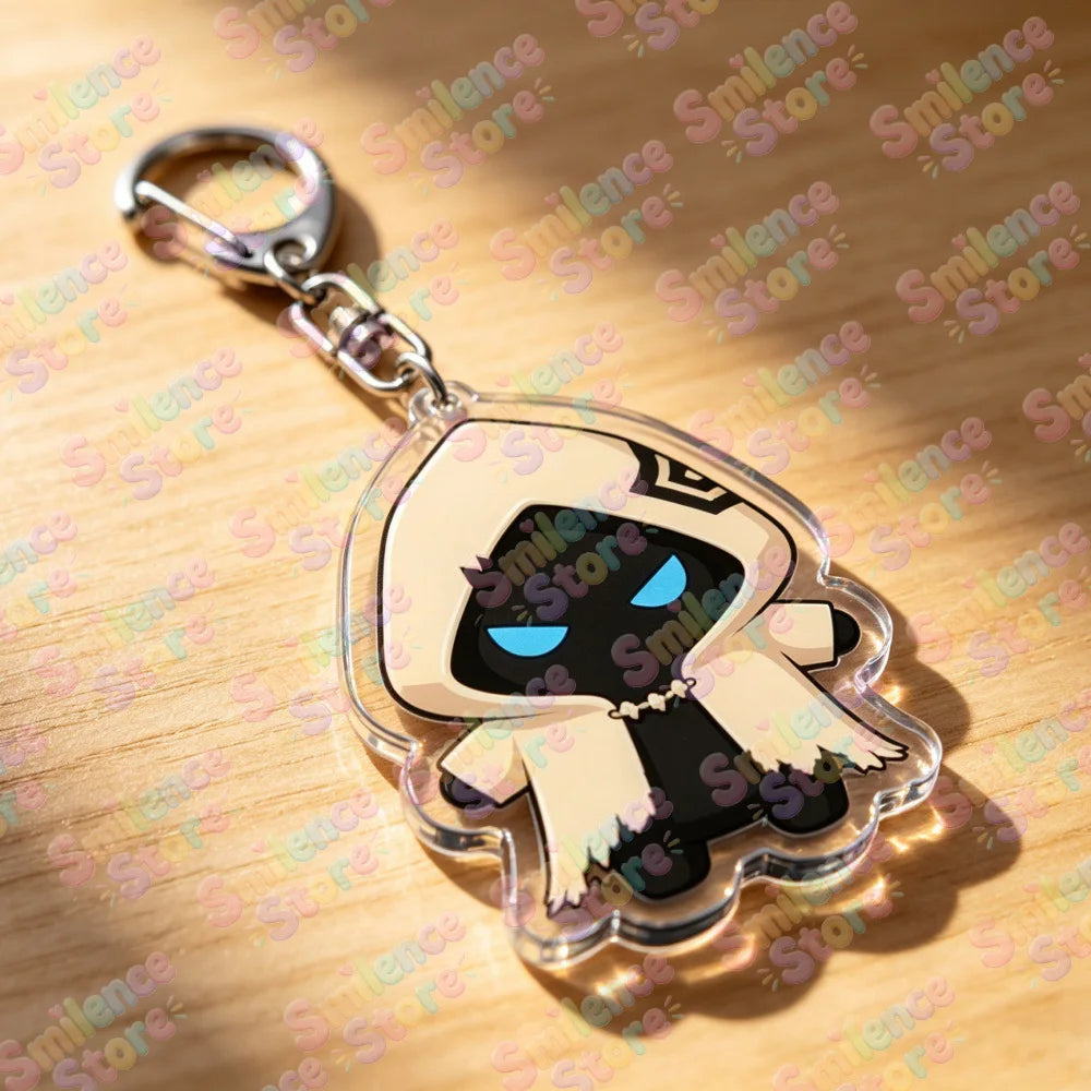 A clear acrylic keychain featuring a stylized black and white gaming or manga character design.
