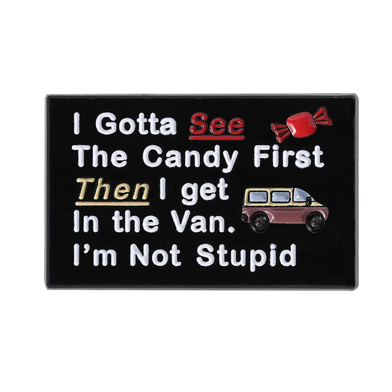 A black enamel lapel pin featuring text that reads I Gotta See The Candy First Then I get In the Van I'm Not Stupid