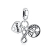 A silver family tree charm necklace featuring a heart pendant and a tree design.