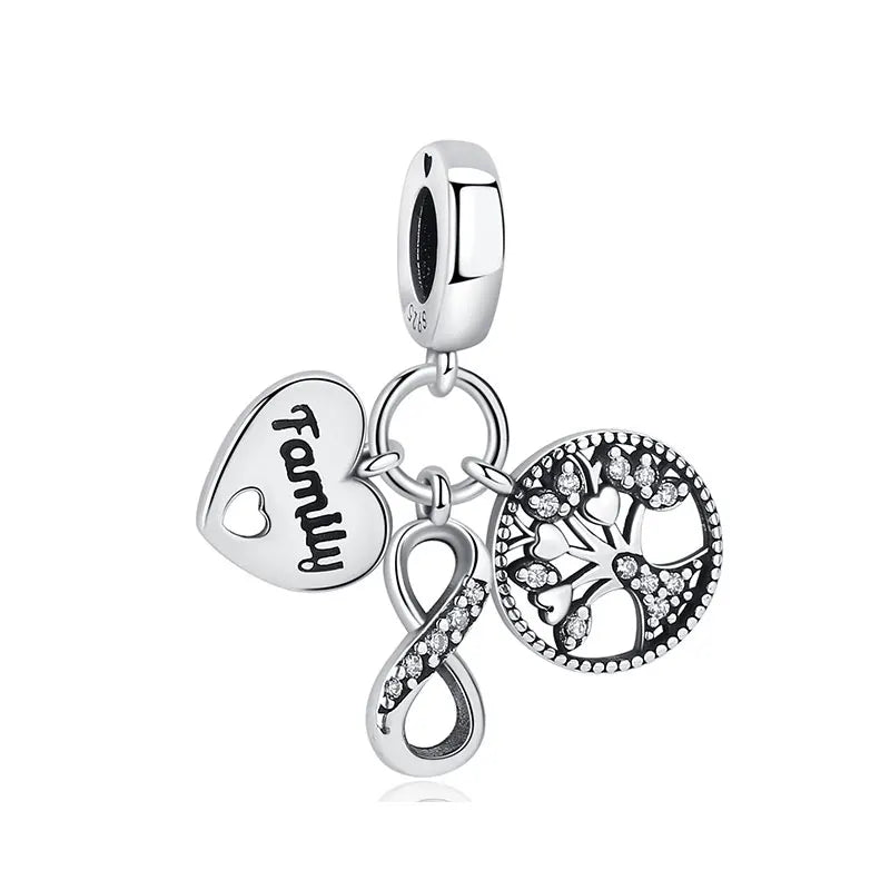 A silver family tree charm necklace featuring a heart pendant and a tree design.
