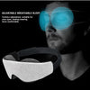 A man wearing an adjustable breathable sleep mask with blue lenses and a black strap.