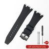 Black silicone watch band with a quick release buckle and a separate pin for replacement