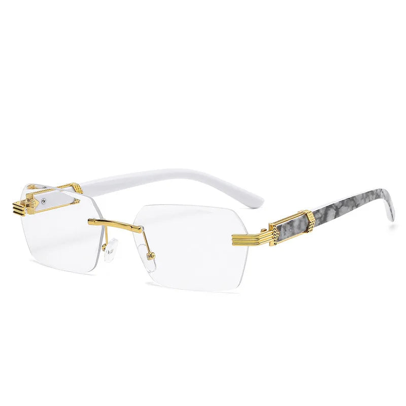 Frameless gradient sunglasses with white and gold accents on a white frame