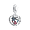 A silver heart pendant featuring a detailed family tree design.