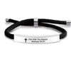 Black cord bracelet with a silver bar and a white plaque engraved with Matthew 28:20