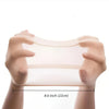 Hands holding a clear stretchy non-slip wig cap measuring 8.6 inches.