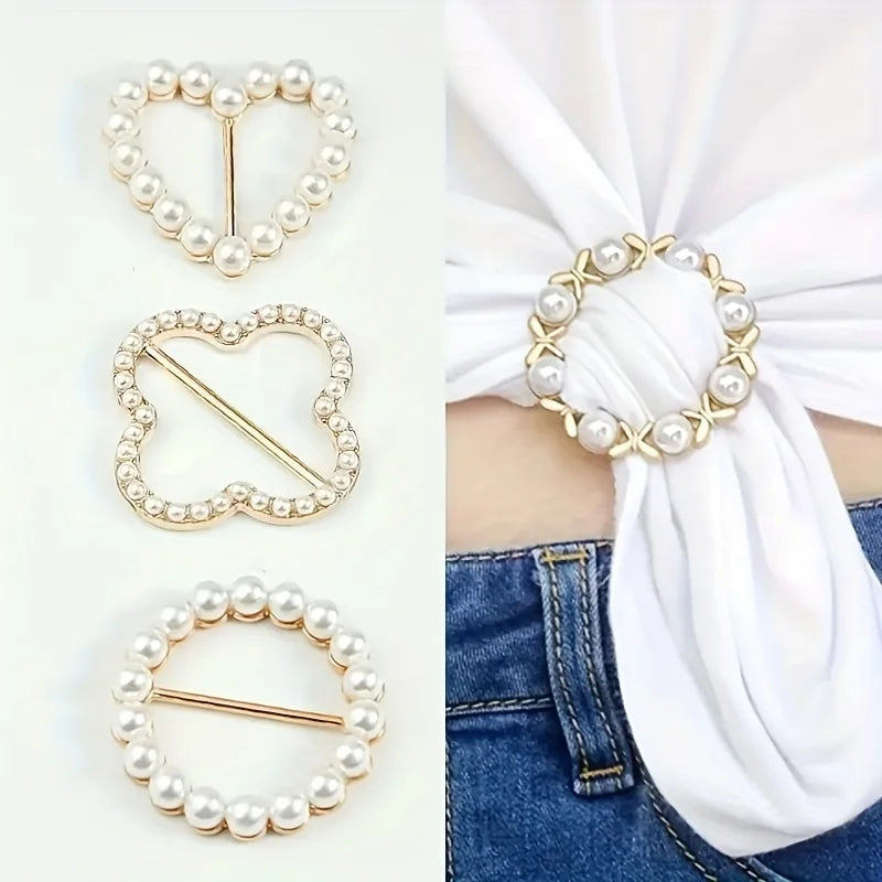 A collection of elegant rhinestone and pearl decorative button clips in gold tone against a white background.