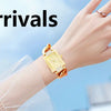A hand wearing a gold plated quartz fashion watch is shown next to text announcing new arrivals.