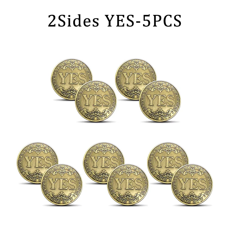 Five vintage antique bronze decision coins stamped with the word YES