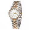 A silver and gold two-tone crystal quartz wristwatch with a metal link bracelet.